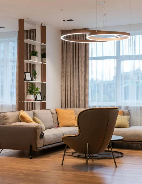 a living room filled with furniture and a large window, by Adam Marczyński, loop lighting, bright modern style, couch, suspended ceiling