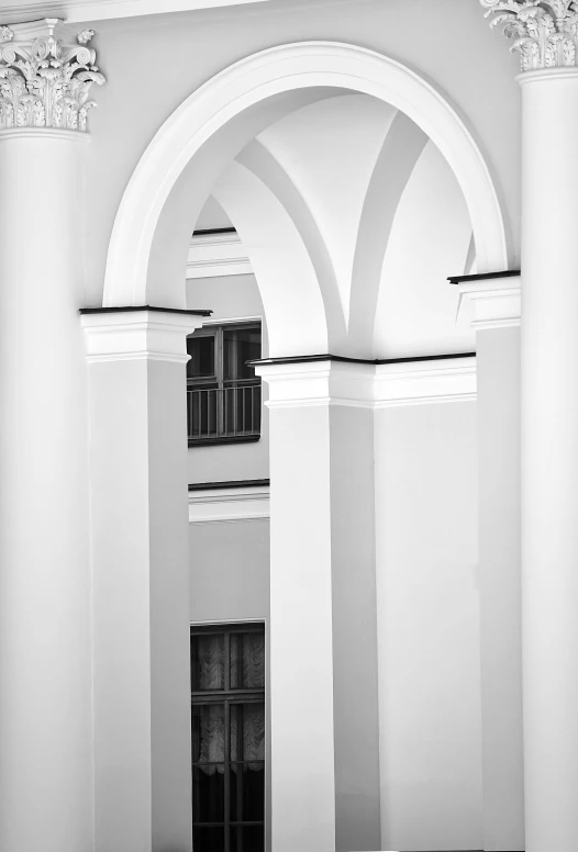 a black and white photo of a building, a black and white photo, academic art, tall arches, white in color, monochrome:-2, white gallery