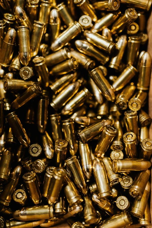 a box full of gold bullet casings, pexels, renaissance, instagram post, tanks, jen atkin, violence
