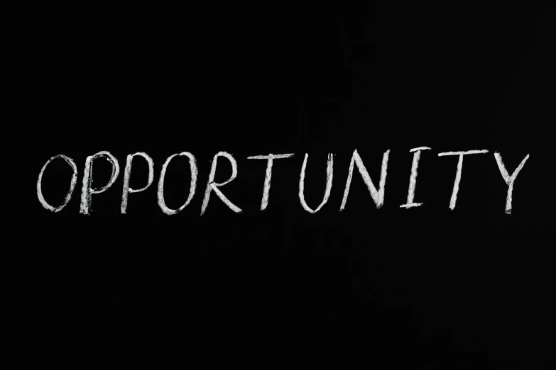 the word opportunity written in white chalk on a blackboard, pexels, happening, with a black background, background image, rectangle, animation