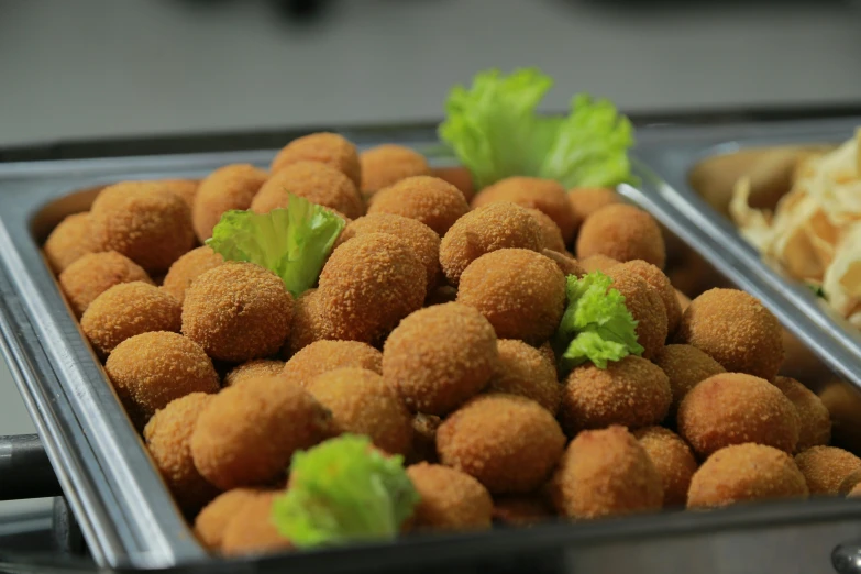 a couple of trays of food sitting on top of a table, inspired by Károly Patkó, puffballs, premium quality, closeup at the food, bullets