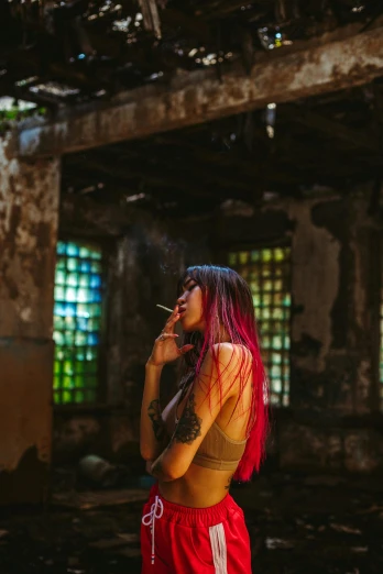 a woman smoking a cigarette in an abandoned building, inspired by Elsa Bleda, pexels contest winner, long crimson hair, panoramic view of girl, of taiwanese girl with tattoos, 2019 trending photo