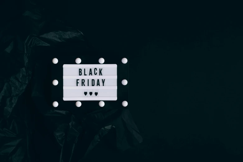 a black friday sign on a black background, by Julia Pishtar, pexels contest winner, hurufiyya, instagram story, holiday season, lofi, white background”