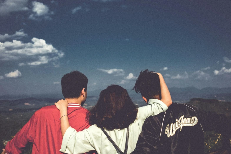 a group of people standing on top of a mountain, trending on unsplash, arm around her neck, teenage boy, vintage color, 15081959 21121991 01012000 4k