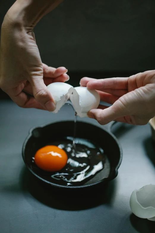 a person is peeling an egg in a frying pan, unsplash, renaissance, dwell, made of glazed, edible, japanese