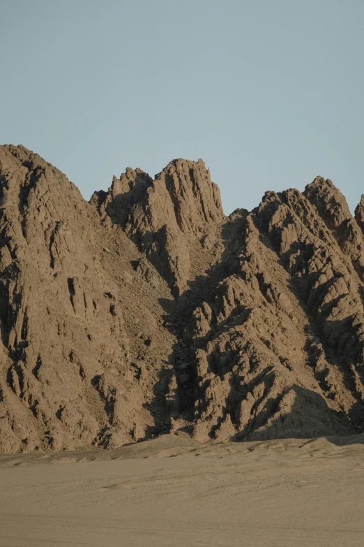 a person riding a horse in the desert, a detailed matte painting, by Jan Wijnants, baroque, geological strata, zoomed in, seen from a distance, sand sculpture