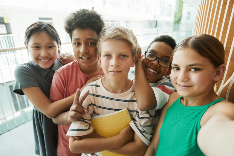 a group of children standing next to each other, gen z, educational, uploaded, medium head to shoulder shot