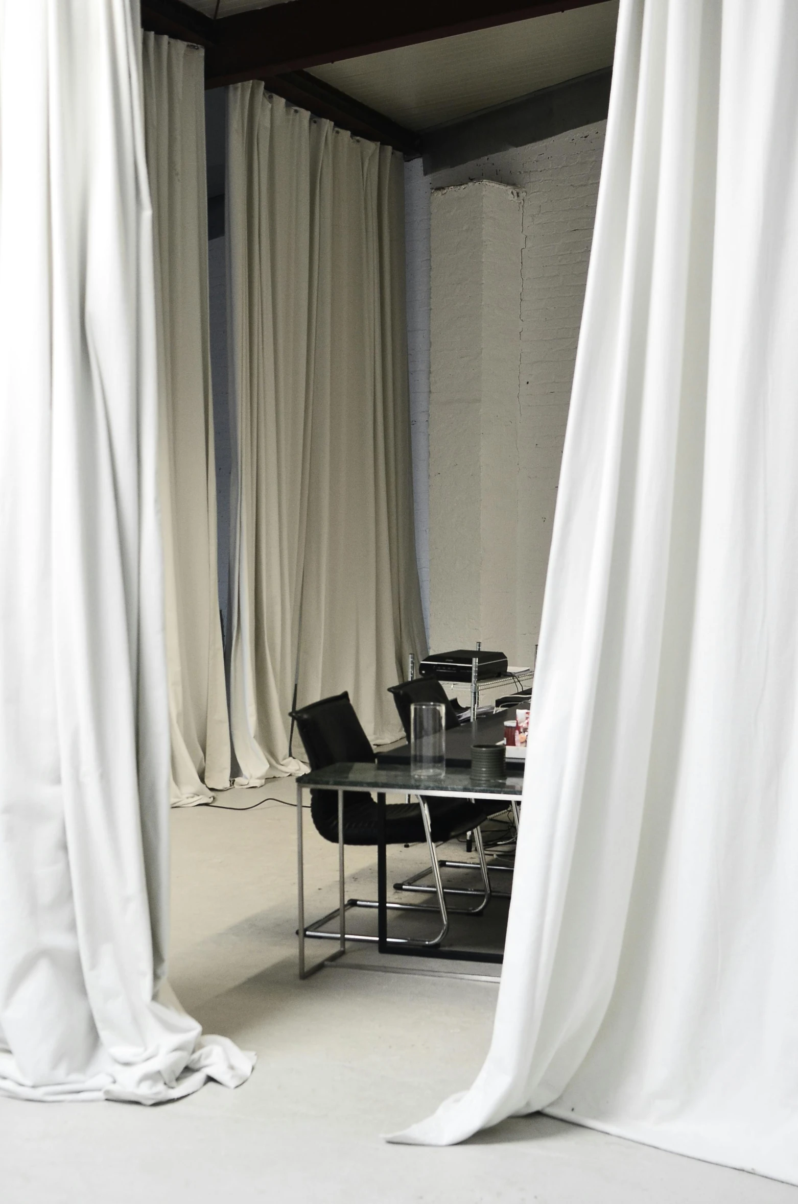 a room that has a table and chairs in it, an album cover, inspired by Antonio Rotta, unsplash, gutai group, draped drapes, tokujin yoshioka, detail shot, backrooms office space