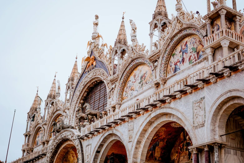 a group of people standing in front of a building, inspired by Quirizio di Giovanni da Murano, pexels contest winner, baroque, buttresses, holy place, seen from outside, viridian and venetian red