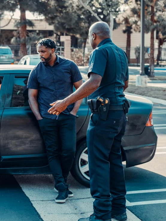 a couple of men standing next to a car, pexels contest winner, renaissance, officer, bruh moment, court session images, ( ( theatrical ) )