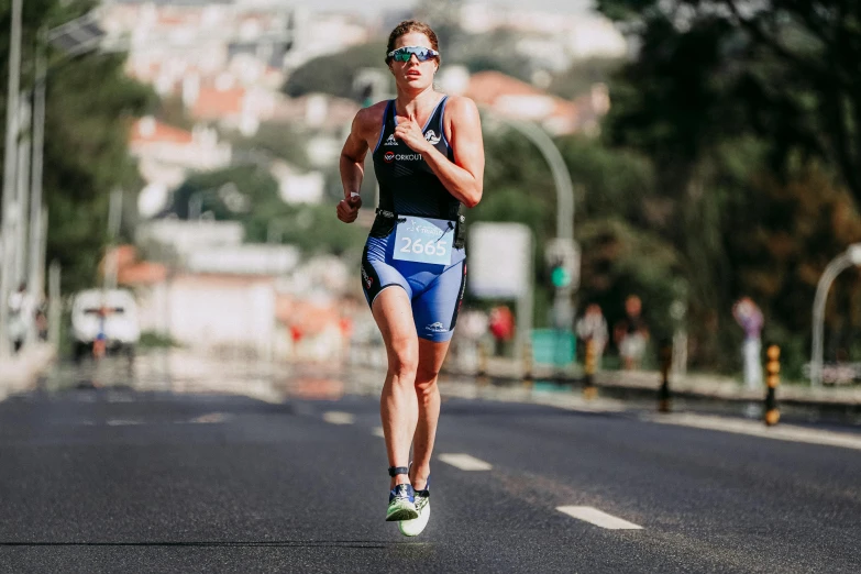 a woman running on a road with buildings in the background, tournament, 🚿🗝📝, lisbon, avatar image