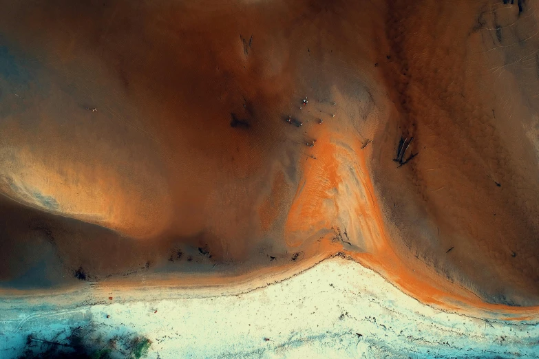 a bird's eye view of a sandy beach, an ultrafine detailed painting, by Lee Loughridge, unsplash contest winner, the australian desert, contrasted colors, dessert, bird\'s eye view