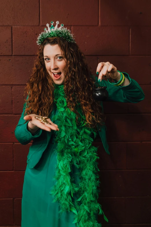 a woman in a green dress posing for a picture, pots of gold, with long curly hair, wearing festive clothing, casting spells