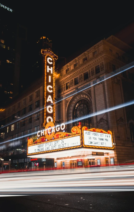 the chicago theater marquee is lit up at night, pexels contest winner, unsplash 4k, high quality photo, fall season, nightclub