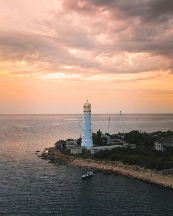 a lighthouse in the middle of a body of water