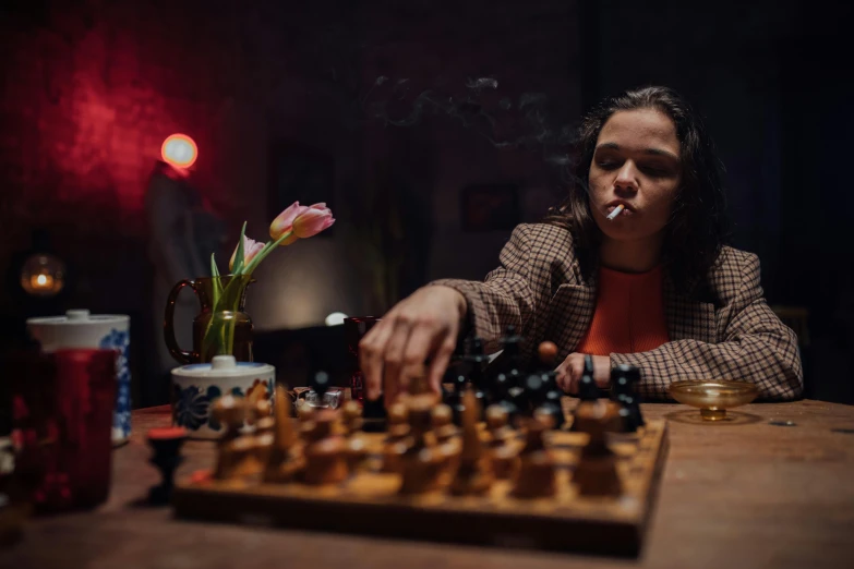 a woman sitting at a table playing a game of chess, a portrait, by Daniel Lieske, pexels contest winner, smoking a pipe, movie promotional image, (night), promotional image