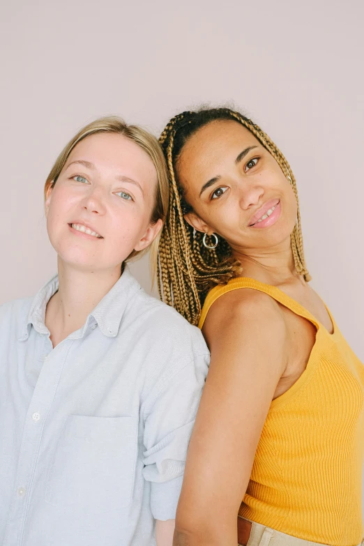 a couple of women standing next to each other, natural skin tones, with a white complexion, ouchh and and innate studio, extremely gendered