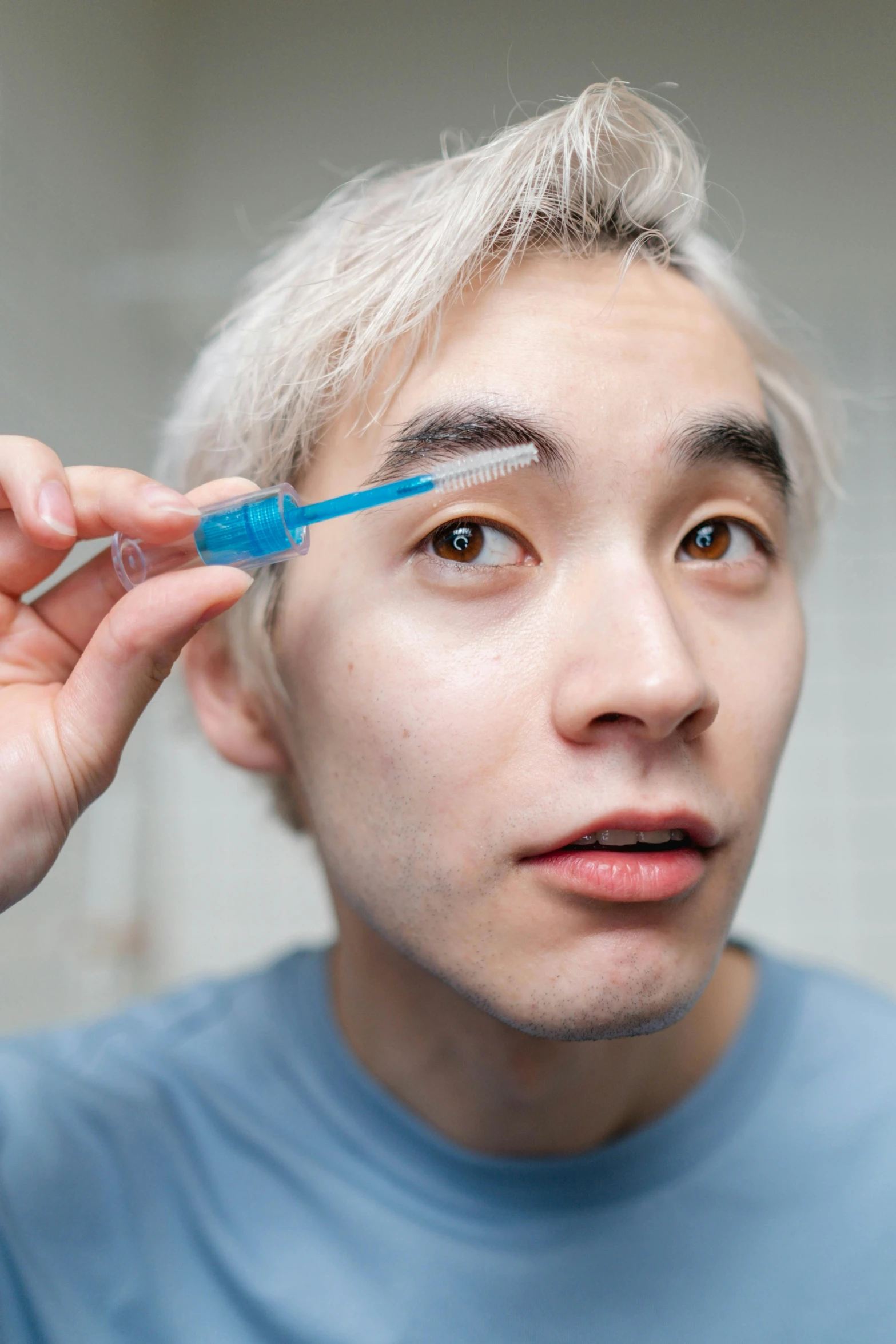 a man brushing his teeth with a toothbrush, inspired by jeonseok lee, reddit, jimin\'s right eyelid swollen, xqc, with an iv drip, groomed eyebrows