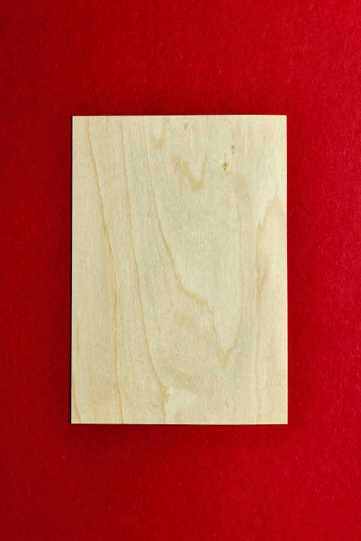 a wooden block on a red background, single panel, portrait n - 9, blank, sycamore