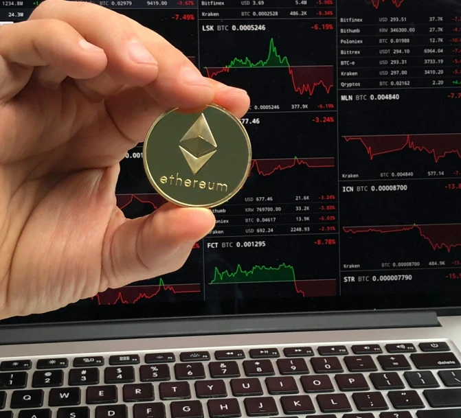 a person holding a bit coin in front of a laptop, pexels, holography, triangles in background, shodan, waveforms on top of square chart, anthroposcen