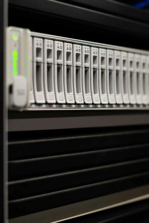 a rack of servers in a server room, by Jason Felix, unsplash, linux mint, portrait closeup, circa 2 0 0 8, mini model