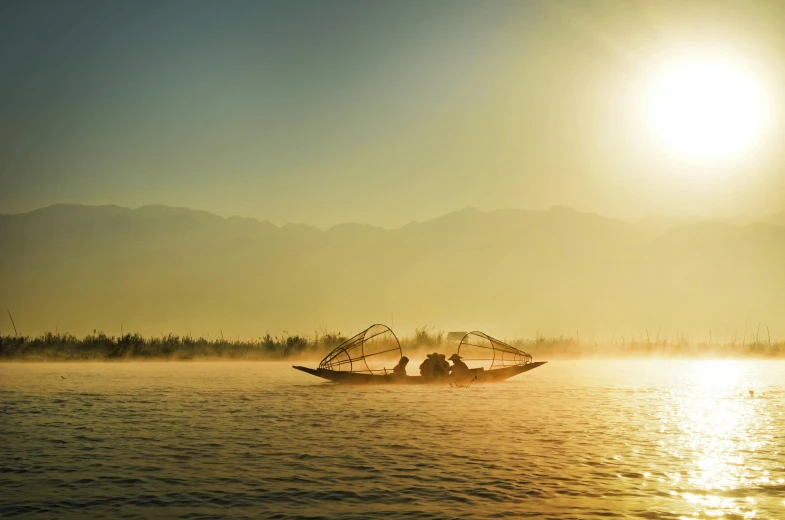 a group of people riding on top of a boat, a picture, unsplash contest winner, hurufiyya, full morning sun, myanmar, fishing, 15081959 21121991 01012000 4k