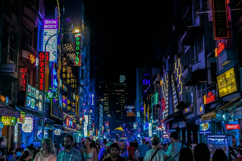 a group of people walking down a street at night, cyberpunk art, pexels contest winner, maximalism, shanghai city, istanbul, purple and blue neon, in the center of the image