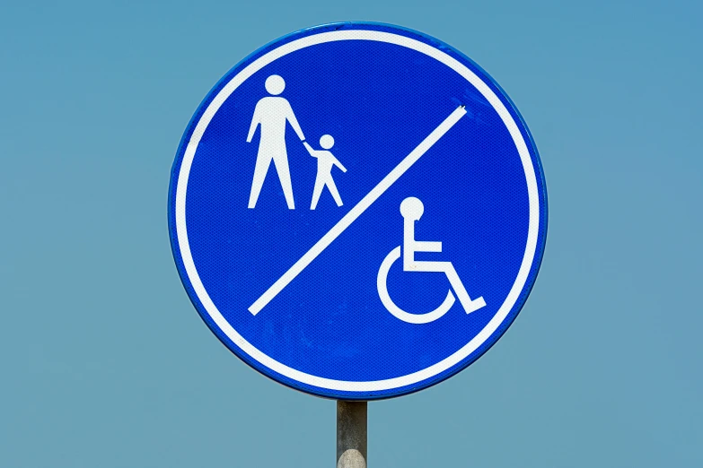 a blue sign with a picture of a man and a child in a wheelchair, a poster, by Adam Marczyński, pixabay, excessivism, very round, no cars, diversity, no nudity