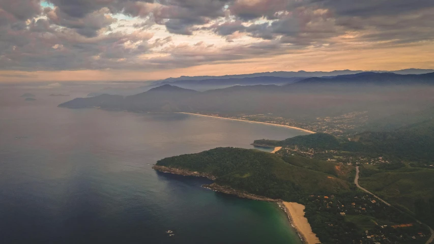 an aerial view of a large body of water, by Matteo Pérez, pexels contest winner, realism, brazil, coastline, late summer evening, flight