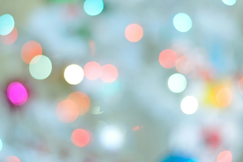a teddy bear sitting in front of a christmas tree, pexels, light and space, colorful refracted sparkles, blue blurred, dots abstract, multicoloured