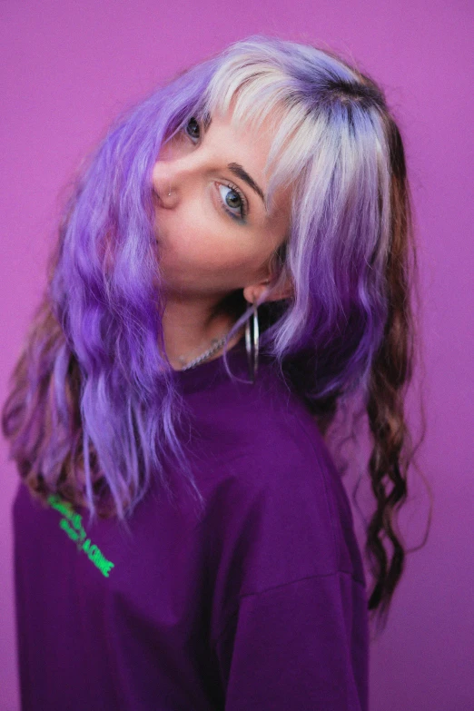 a woman with purple hair wearing a purple shirt, an album cover, inspired by Elsa Bleda, trending on pexels, hair whitebangs hair, colorful]”, split dye, pastelwave