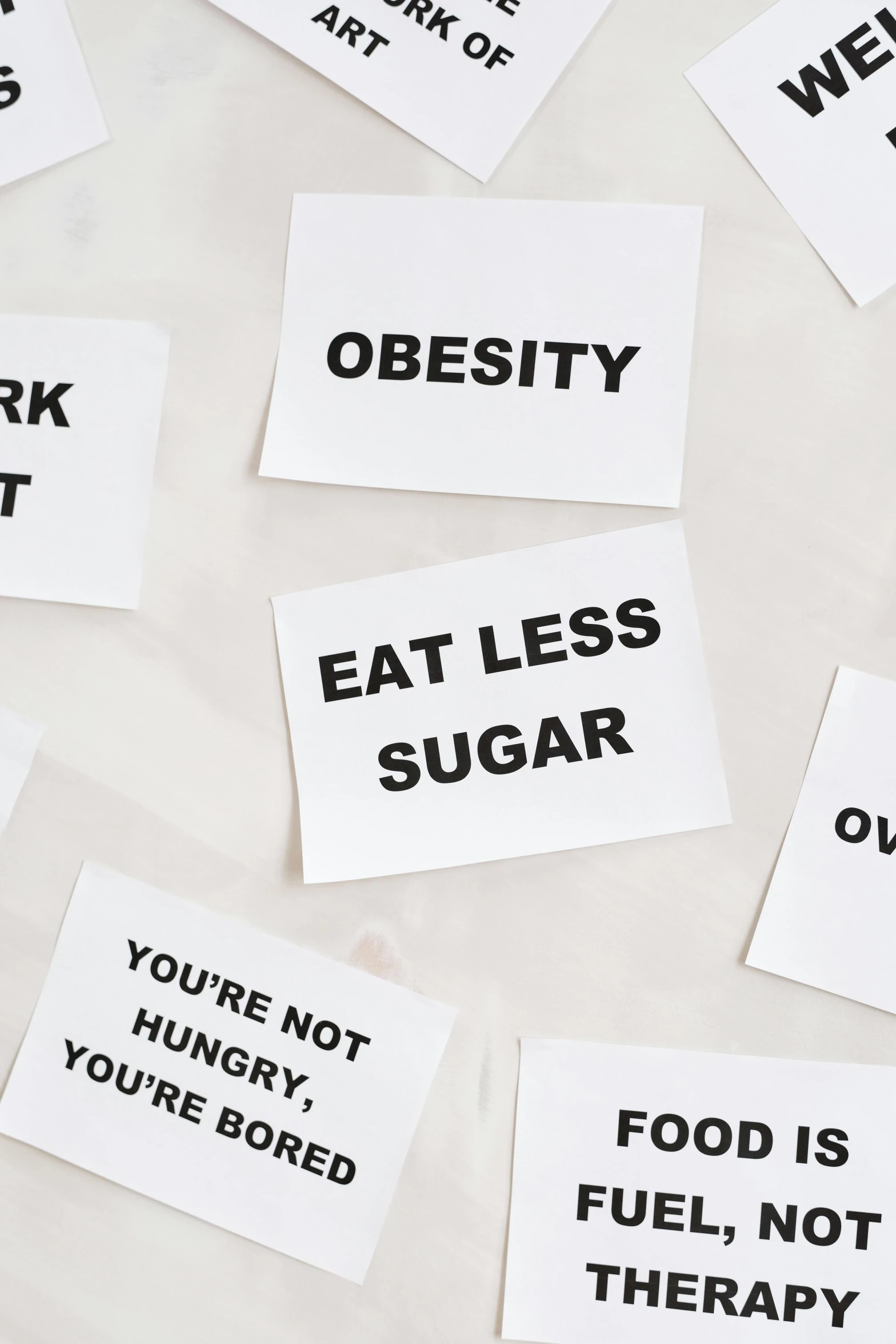 a bunch of stickers sitting on top of a table, by Nicolette Macnamara, trending on pexels, new objectivity, morbidly obese, placards, sugar, black on white background