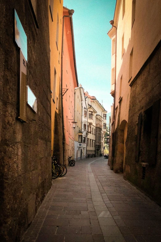 a narrow street in an old european city, a picture, unsplash contest winner, renaissance, profile image, colored photo, square, calm