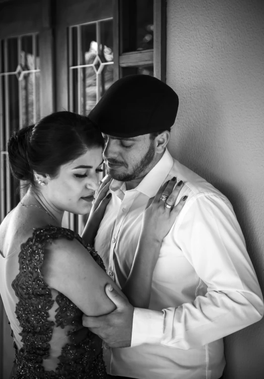 a black and white photo of a man and a woman, a black and white photo, inspired by Yousuf Karsh, reddit, romanticism, ghostly tango, high details!, promo image, romantic couple