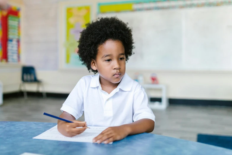 a young boy sitting at a desk with a pencil in his hand, pexels contest winner, ashcan school, long afro hair, 15081959 21121991 01012000 4k, thumbnail, girl wearing uniform