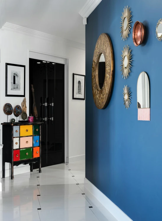 a hallway with a bunch of mirrors on the wall, by Julia Pishtar, blue and black scheme, thumbnail, multi - coloured, luxury condo interior