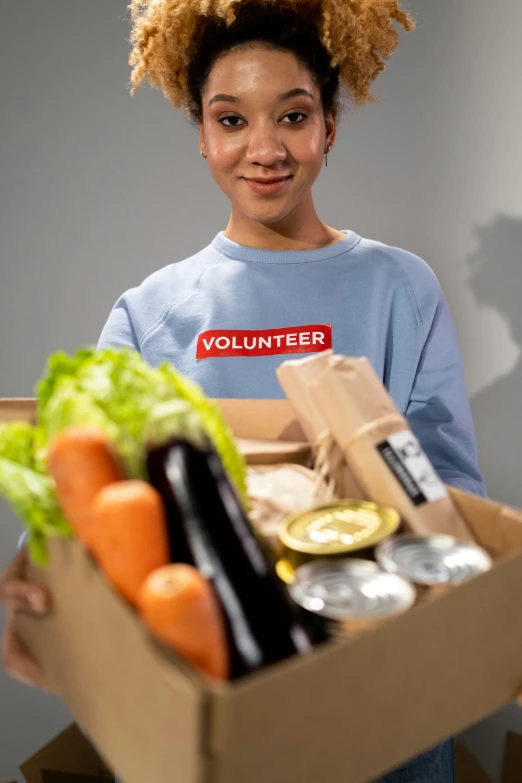 a woman holding a box full of food, information, jugendstill, v tuber, promo image