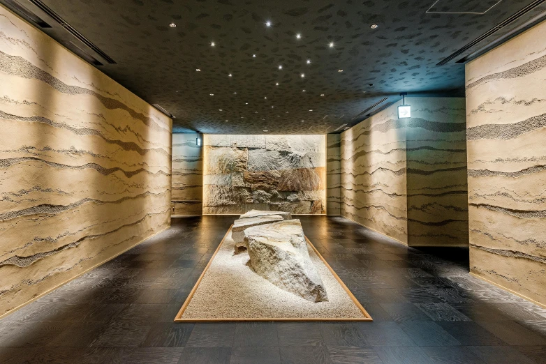 a long hallway with a stone sculpture in the middle of it, inspired by Yoshio Markino, unsplash, interactive art, mineral collections, thumbnail, stone table, high resolution product photo