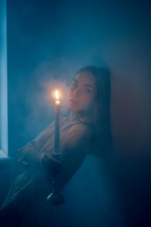 a woman holding a candle in front of a window, inspired by Elsa Bleda, romanticism, holding a blue lightsaber, highkey lighting, ghost room, profile image