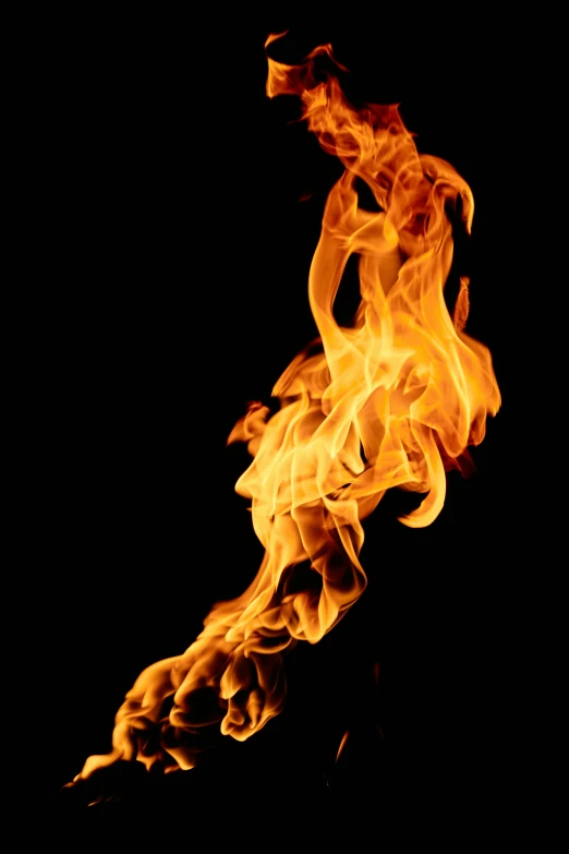 a close up of a fire on a black background, by Jan Rustem, avatar image, about to step on you, looking partly to the left, long