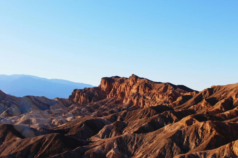 a view of the mountains in death valley national park, death valley national park, death valley national park, death valley national park, death valley, unsplash contest winner, art nouveau, background image, obsidian towers in the distance, erosion algorithm landscape, tie-dye