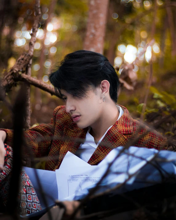 a man and a woman sitting next to each other in the woods, an album cover, inspired by Xia Yong, sumatraism, cai xukun, candid portrait photo, profile picture 1024px, portrait n - 9