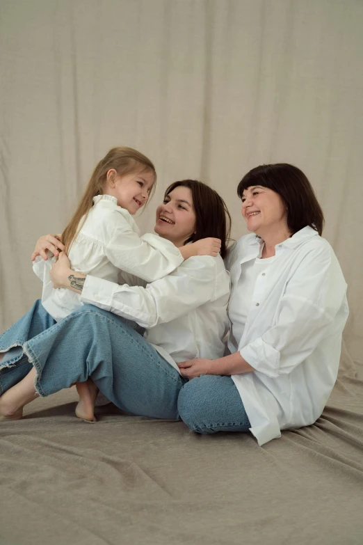 a group of women sitting on top of a bed, white wrinkled shirt, profile image, children's, plus-sized