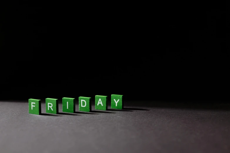 three green cubes with the word friday written on them, a picture, pixabay, dark. no text, tilt-shifted, x - day, nfts