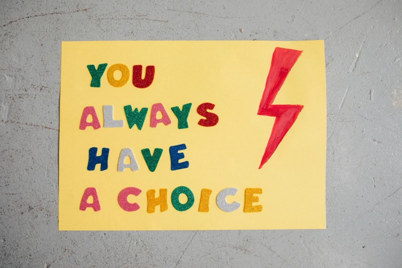 a sign that says you always have a choice, a child's drawing, by Julia Pishtar, pexels contest winner, mail art, lightning bolt, 3 colour print, lgbt art, ace card
