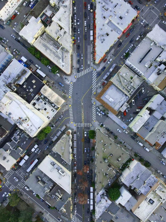 an aerial view of an intersection in a city, by Adam Rex, unsplash contest winner, photorealism, ignant, sf, square, 4k photo gigapixel