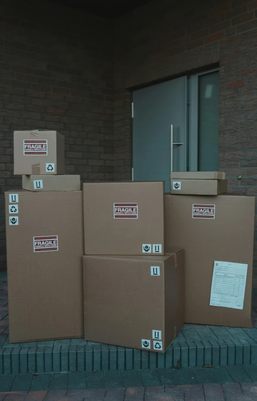 a bunch of boxes sitting outside of a building, indoor picture, brown, phase 2, collection product