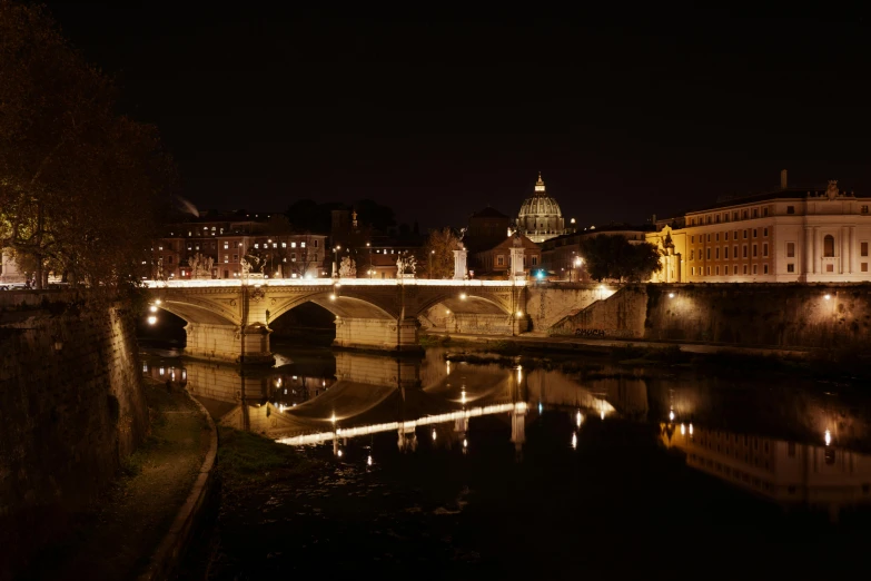 a view of a bridge over a river at night, by Cagnaccio di San Pietro, pexels contest winner, neoclassicism, parce sepulto, panorama, profile image, nighttime!