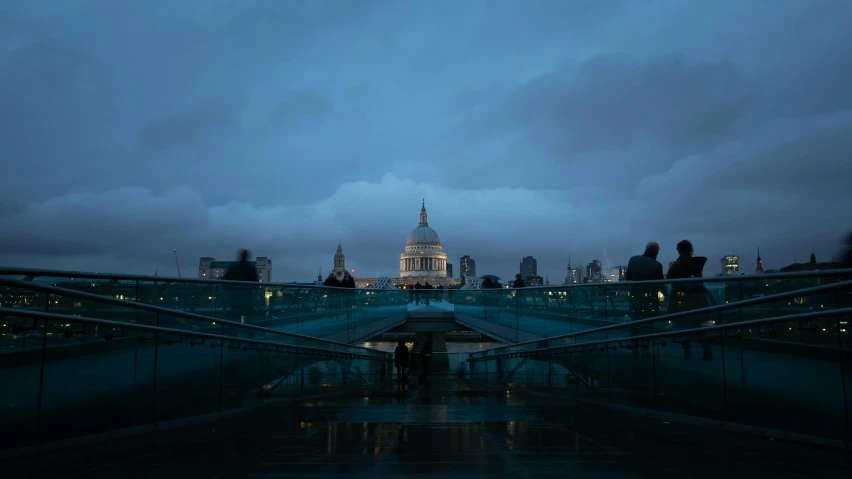 a group of people standing on top of a bridge, inspired by Thomas Struth, unsplash contest winner, hyperrealism, london at night, dome, overcast, cathedral