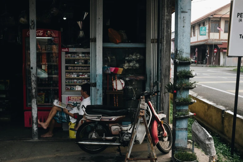 a motorcycle parked in front of a store, a portrait, pexels contest winner, pharmacy, old asian village, conde nast traveler photo, 🦩🪐🐞👩🏻🦳